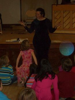 Allison tells a story at a Family Dance at Heberton Hall, Keene, NH. Photo by Michael Catanzaro.